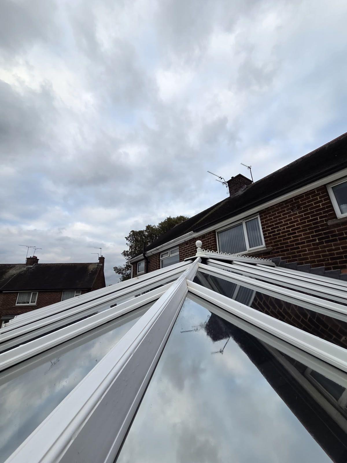Conservatory roof on a red-brick house